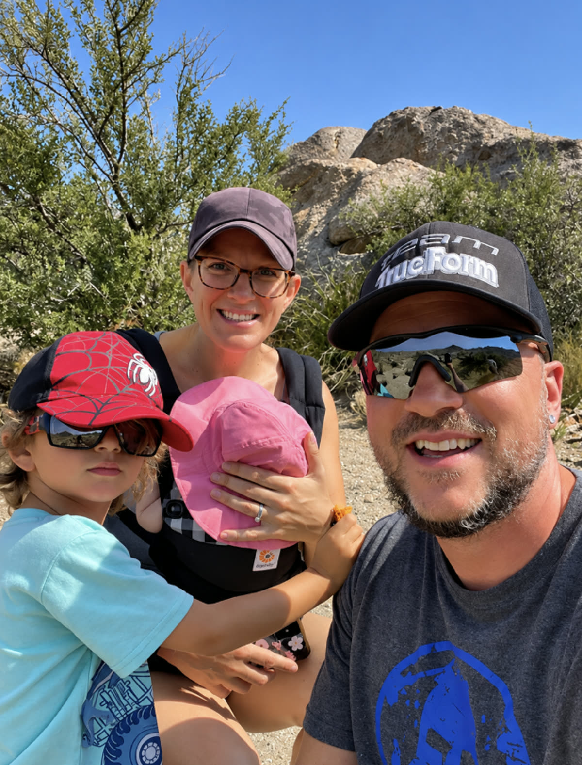 Drew and Dorothy with their kids outdoors